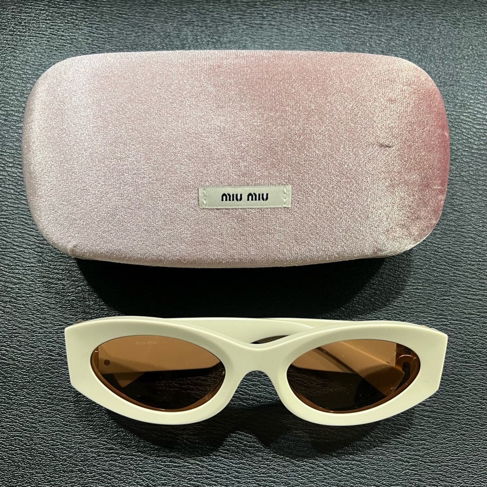 Miu Miu 0MU 11WS Acetate Oval Sunglasses.